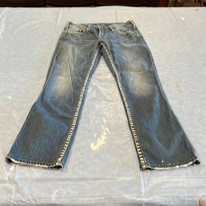 Women’s silver Suki, mid straight size 29